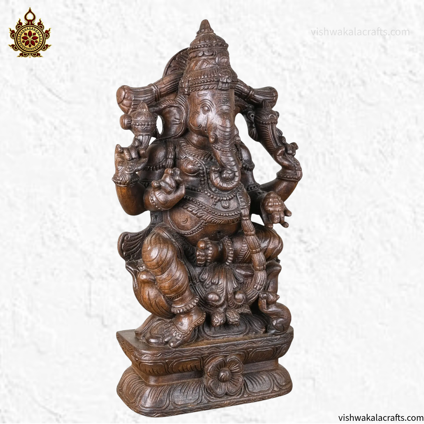 Handcrafted Wooden Ganesha Statue in Traditional Temple Setting