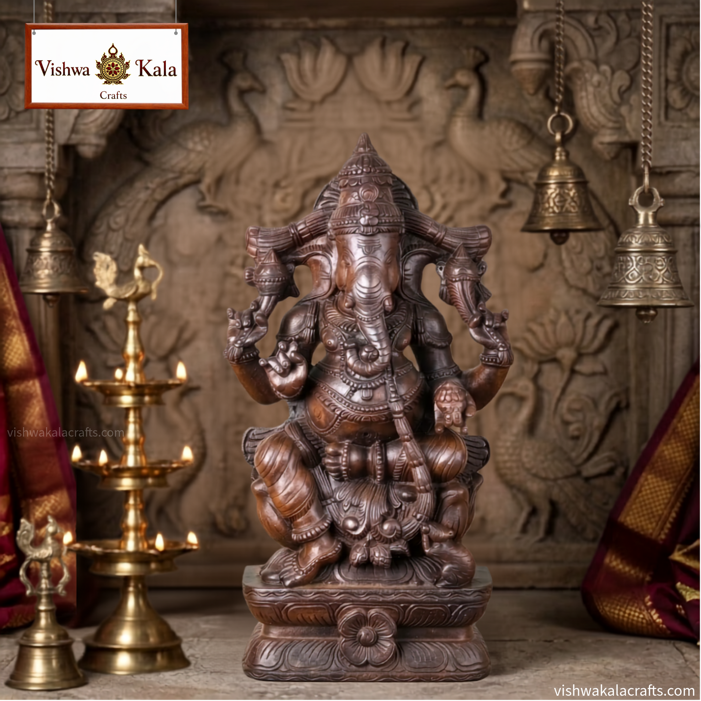 Handcrafted Wooden Ganesha Statue in Traditional Temple Setting